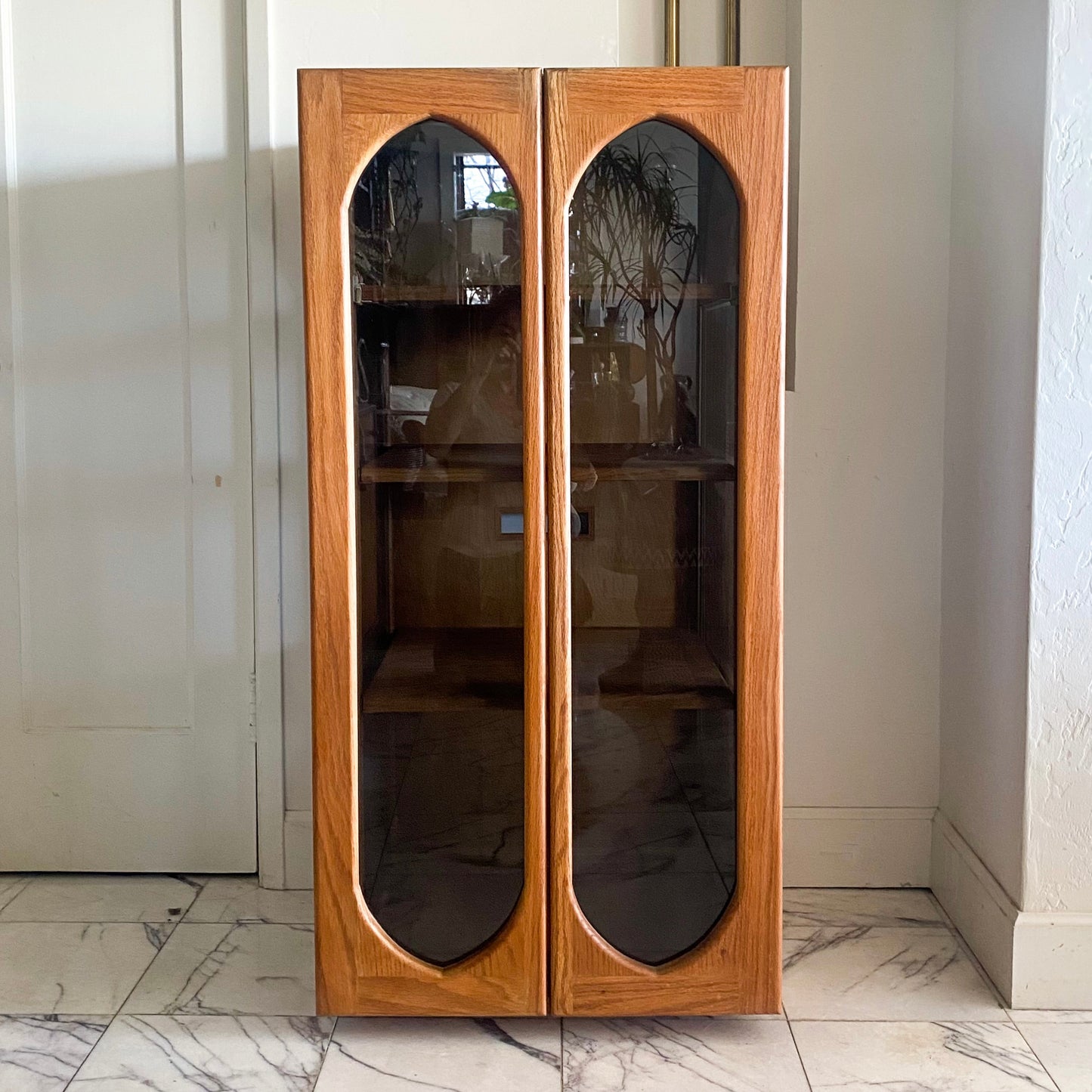 Arched oak + smoked glass cabinet