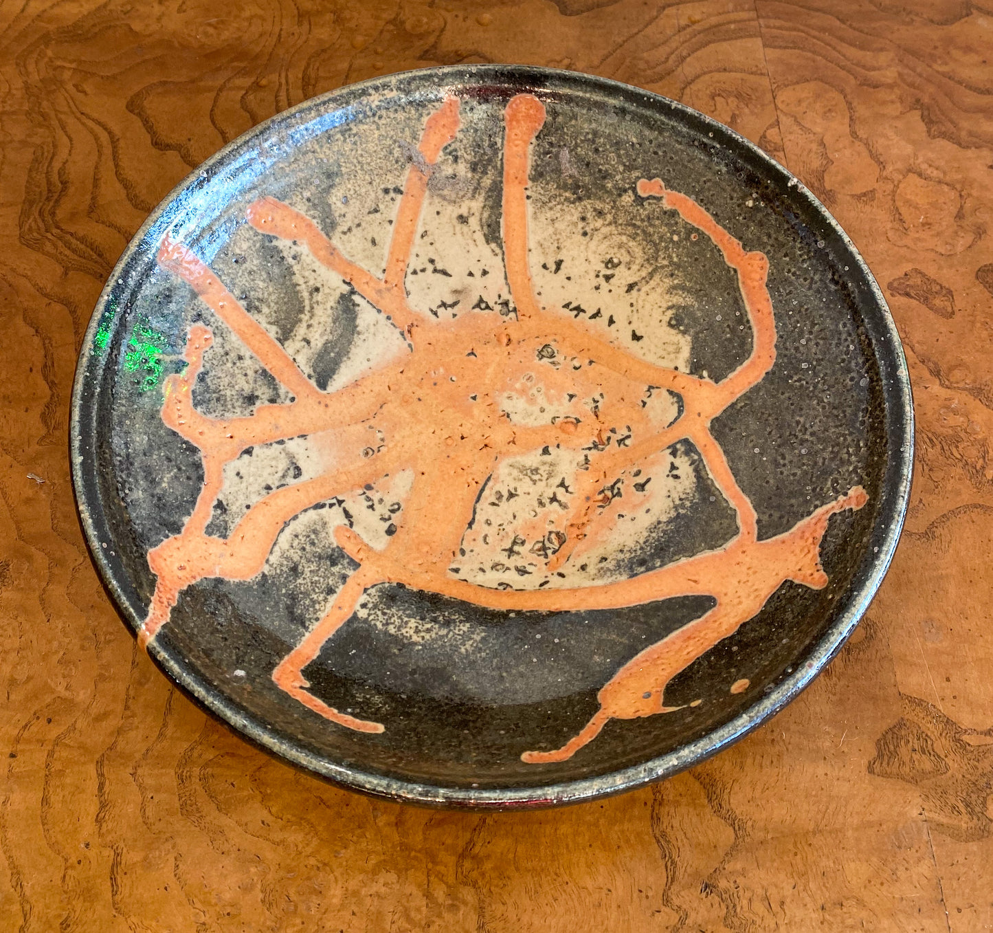 Orange and black studio pottery low bowl