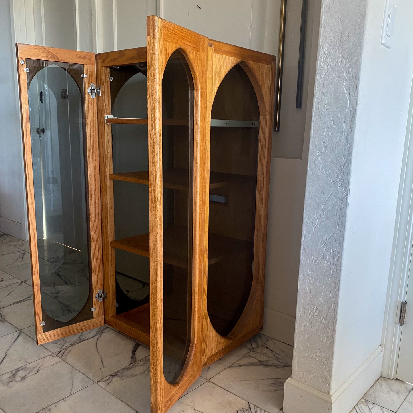 Arched oak + smoked glass cabinet